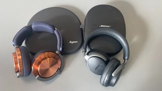 Dyson OnTrac next to Bose QuietComfort Ultra Headphones with their cases