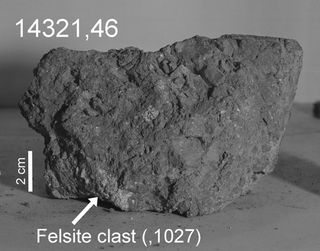 A moon rock brought back by Apollo 14 astronauts in 1971 may contain a tiny piece of the ancient Earth (the "felsite clast" identified by the arrow).