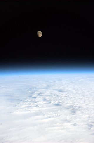 The Earth and the moon as seen on Jan. 15, 2011 from the International Space Station by astronaut Paolo Nespoli.