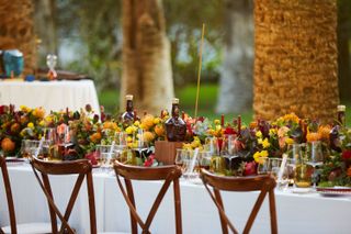 An adorned table with flowers in the Royal Salute Villa Luisa