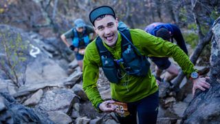 a photo of writer TJ Fink hiking with the Salomon Active Skin 8