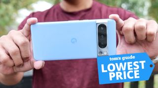 Pixel 8 Pro being held with a Prime Day banner