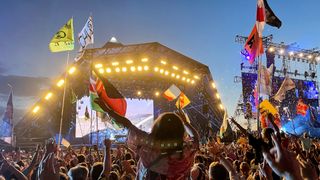 The Pyramid Stage at Glastonbury at dusk