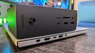 Image of a UGREEN Thunderbolt 4 dock and the ASUS ROG Zephyrus G14 (2024) with a USB4 port.