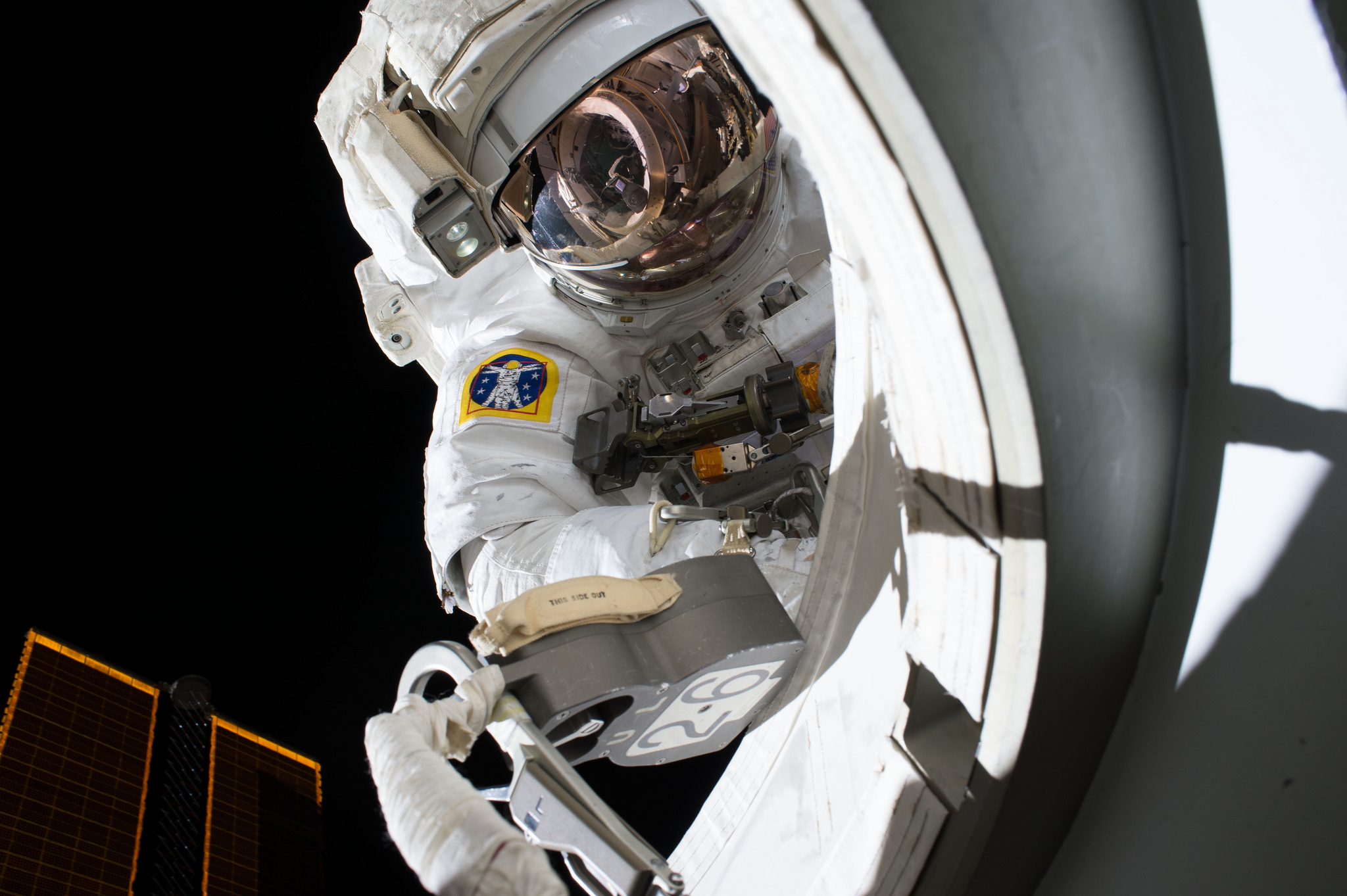 NASA astronaut Scott Kelly is seen during his first spacewalk outside the International Space Station on Oct. 28, 2015. Kelly and crewmate Tim Kopra will make a 3-hour spacewalk today (Dec. 21) to fix a stuck railcar on the station.