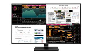 An LG 43UD79-B monitor showing split screens