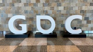 A large GDC logo on the show floor