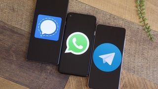 Signal, WhatsApp, and Telegram logos on Android phones