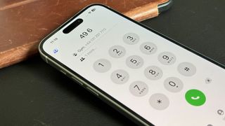 iOS 18 Phone app showing T9 keyboard