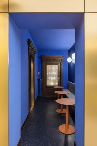 The colourful interior of Contraste Restaurant in Milan