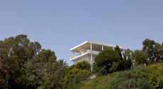 Villa Baizeau hero exterior peaking from trees