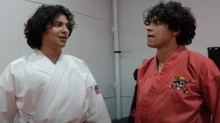 Xolo Maridueña and Iñaki Godoy talk after a training session in choreographed karate fight scenes