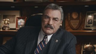 Frank behind office desk in Blue Bloods