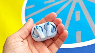 Skullcandy EcoBuds in light blue in charging case