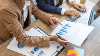 Businessmen studying a report