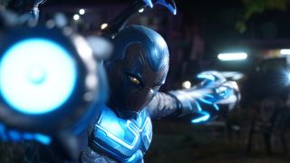 Xolo Maridueña's Jaime Reyes showing off Blue Beetle armor's arm cannons