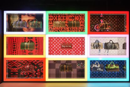 A wall of Louis Vuitton bags in LV Dream exhibition