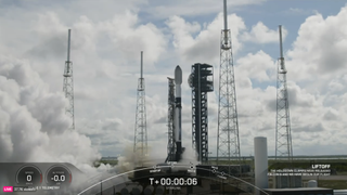 A SpaceX Falcon 9 rocket aborts its launch during engine ignition billowing spoke from the pad