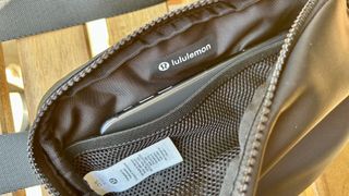 a photo of fitness editor wearing the lululemon everywhere belt bag