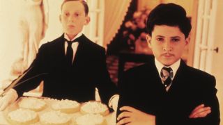 Dandy Dan (Martin Lev) in front of some flans in Bugsy Malone.