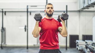 Man exercising with dumbbells