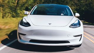 Tesla Model 3 in white on road