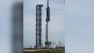 SpaceX's first orbital Starship SN20 is stacked atop its massive Super Heavy Booster 4 for the first time on Aug. 6, 2021 at the company's Starbase facility near Boca Chica Village in South Texas. They stood 395 feet tall, taller than NASA's Saturn V moon rocket.