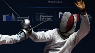France's Romain Cannone takes a hit in the Epee ahead of the 2024 Paris Olympic Fencing.