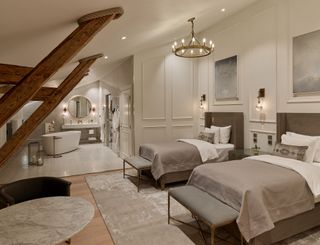 Loft suite with wooden beams at The Hotel Maria