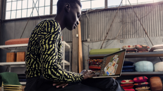 Woman using the new MacBook Air