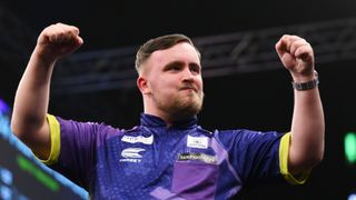 Luke Littler celebrates after winning his match ahead of the World Matchplay Darts