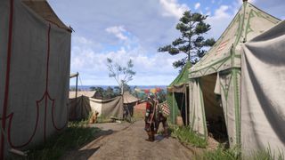 A large enemy camp in Kingdom Come: Deliverance 2.