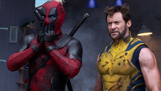 Deadpool holds his hands to his face as Wolverine stands next to him in Marvel's Deadpool and Wolverine film, the latest addition to our X-Men movies in order guide