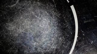 Scratched surface of a kitchen glass ceramic stove