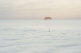 The Soyuz TMA-18M spacecraft is seen as it lands with Expedition 46 Commander Scott Kelly of NASA and Russian cosmonauts Mikhail Kornienko and Sergey Volkov of Roscosmos near the town of Zhezkazgan, Kazakhstan on Wednesday, March 2, 2016 (Kazakh time).