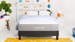 The Nectar Essential Hybrid mattress in a bedroom