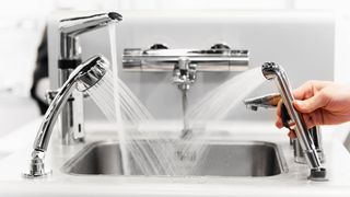 Multiple faucets running in a sink