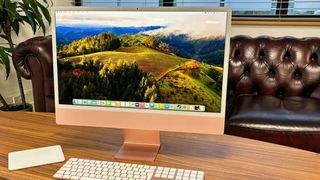 One of the best photo editing PCs, the Apple iMac 24-inch, in an office