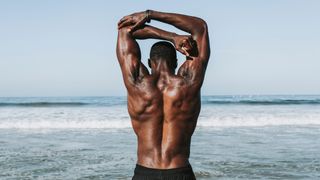 a photo of a man with strong back muscles 