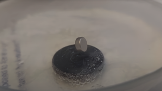 Home-cooled liquid nitrogen being used to levitate a magnet.