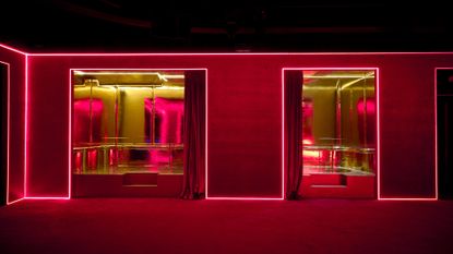 Silencio New York boasts eclectic red and golden interiors drip in neon lights