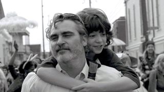 Joaquin Phoenix and Woody Norman in C'mon C'mon.