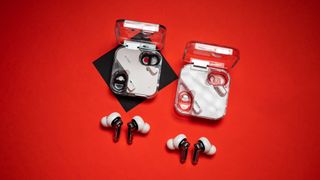 Nothing Ear (2) earbuds review on red background