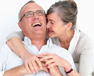 elderly couple laughing