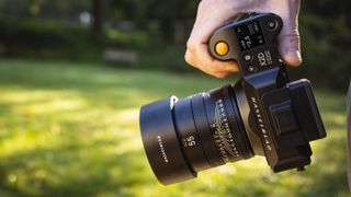 The Hasselblad X2D camera in hand