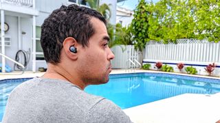 Anker Soundcore Space A40 worn by reviewer Alex Bracetti