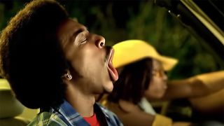 Ludacris singing in a convertible in the "Move B----" music video.