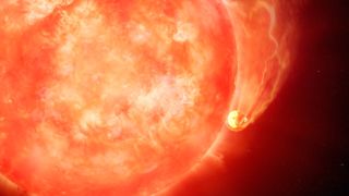 A red giant star engulfs an orbiting planet.