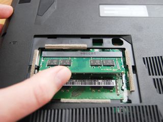 Push in the stick of RAM.