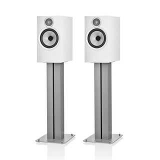 Bowers & Wilkins 606 S3 speakers on stands against white background